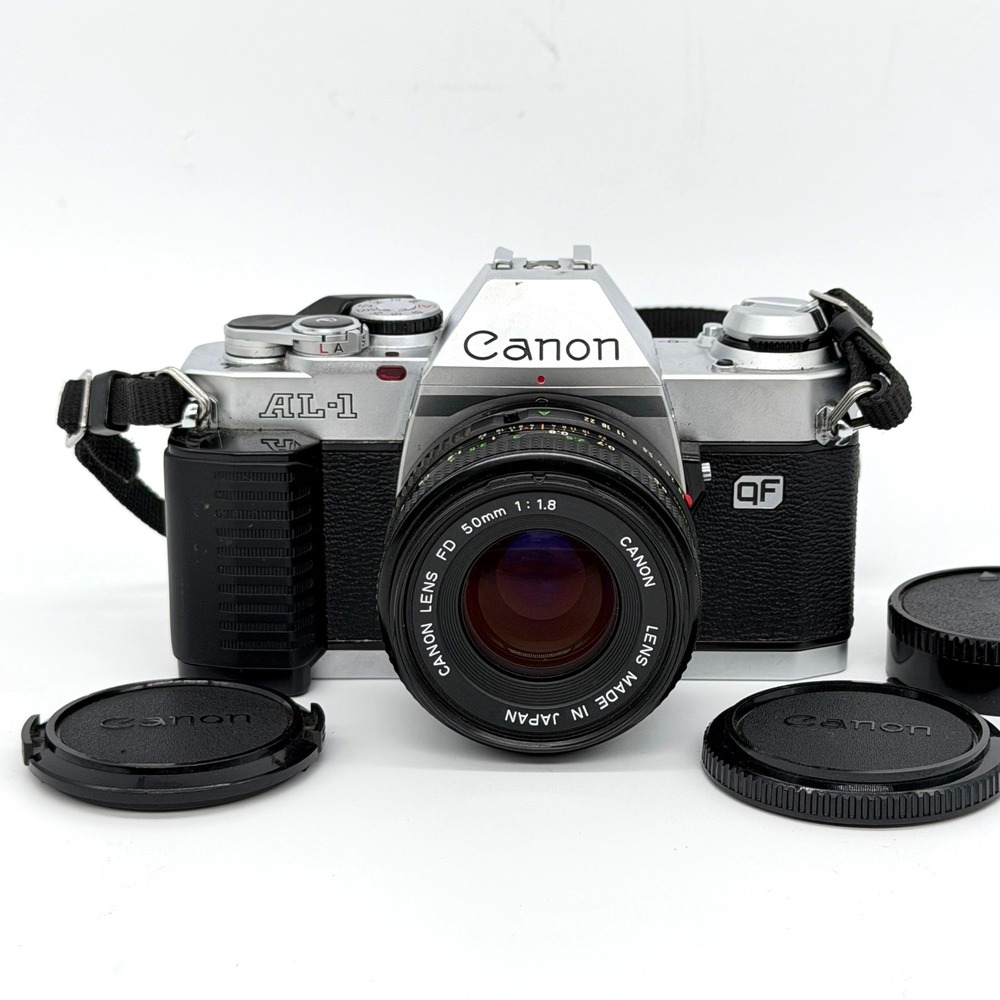 Canon AL-1 QF 35mm Film SLR Camera FD 50mm f1.8 Lens Silver Tested New Seals